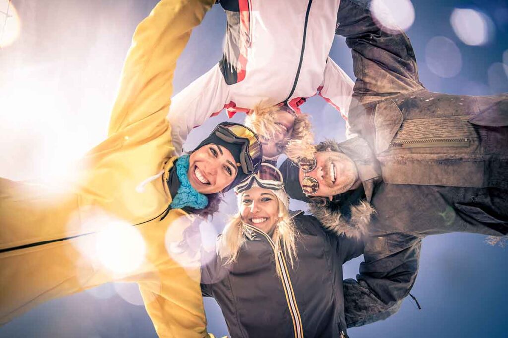 Group friends having fun snow